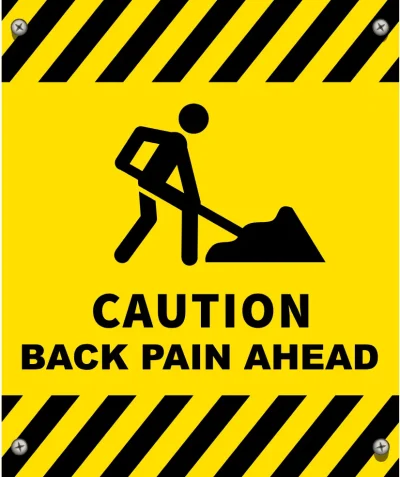 Yellow warning sign with man digging. The sign says "Caution. Back Pain Ahead" THis is to promote Construction Work and Back Health awareness