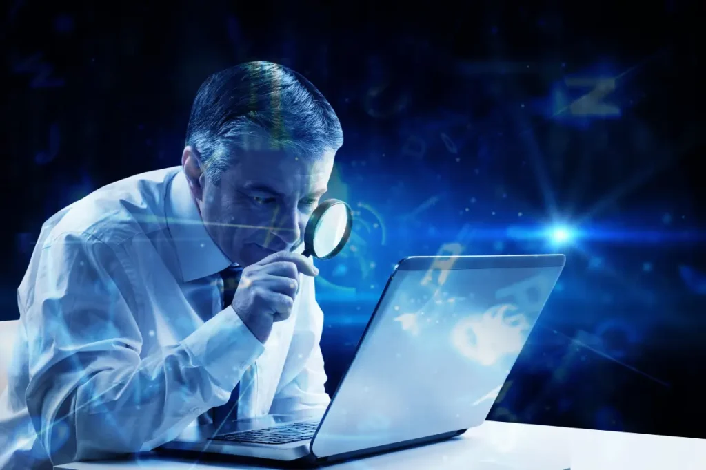 Mature businessman searching for clinical investigator sites with magnifying glass against blue background with letters